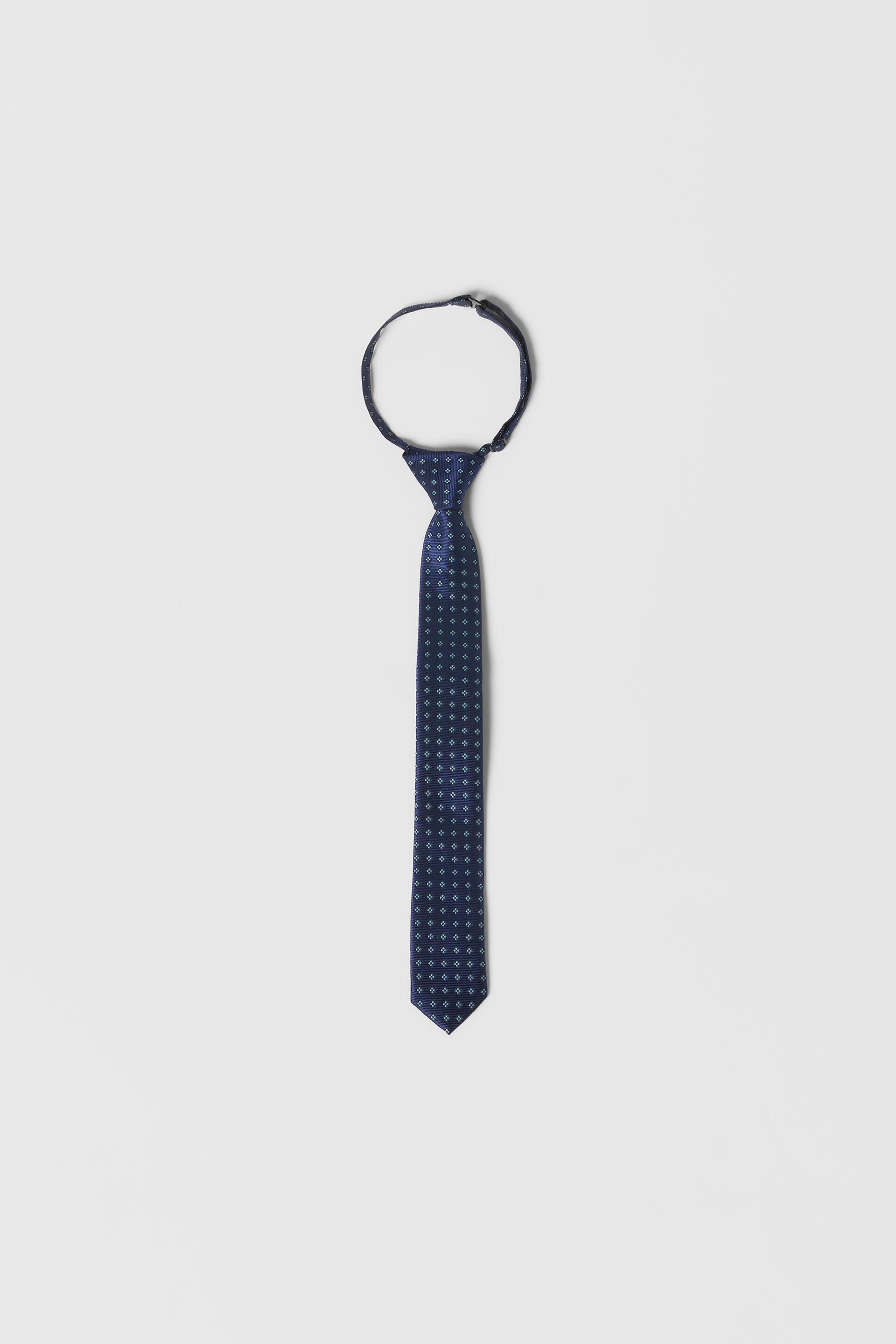 

ГАЛСТУК С АЛМАЗНЫМ И ТОЧЕЧНЫМ ПРИНТОМ