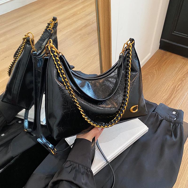 

Spring new portable French oil wax leather shoulder bucket diagonally across the armpit women s large-capacity bag versatile
