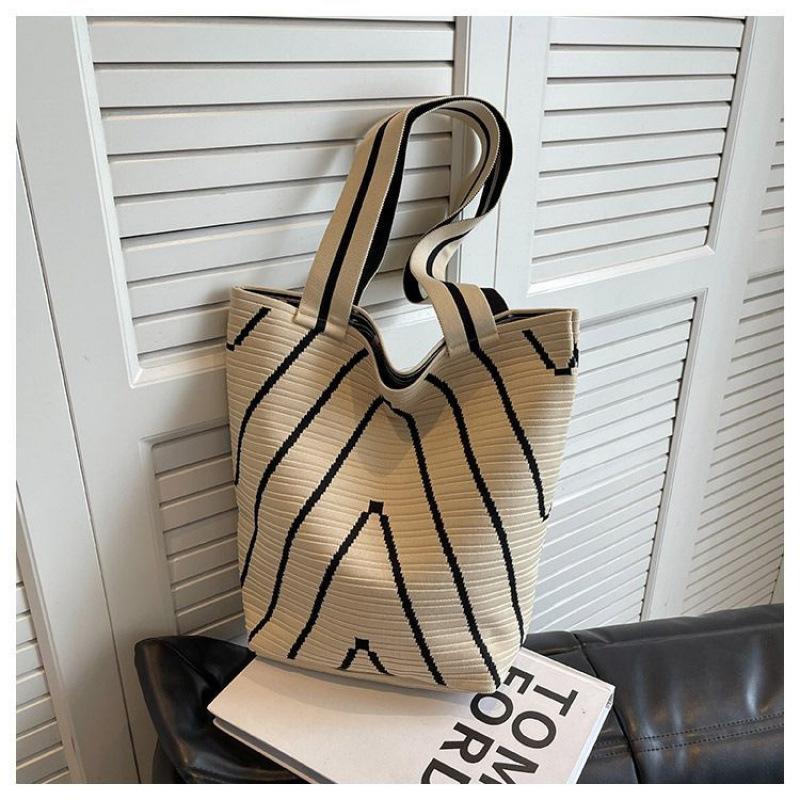 

New niche wave women s bag knitted bag hot mom portable fashion Korean version large capacity shoulder bag striped simple білий
