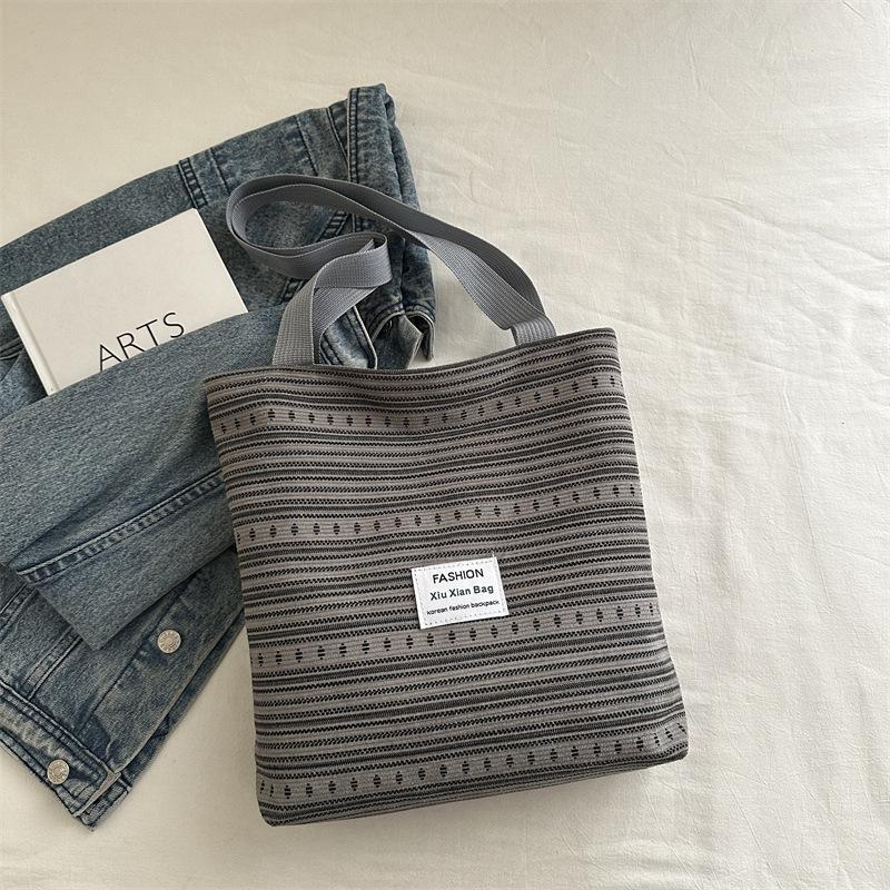 

ins стиль японская сумка женская 2025 летняя мода полосатая ручная сумка на плечо женская классическая сумка-тоут для通勤 серый