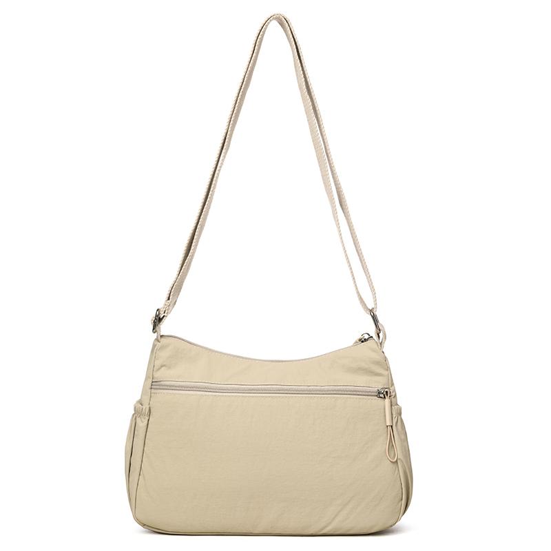 Dameskulderveske med stor kapasitet og lett vekt