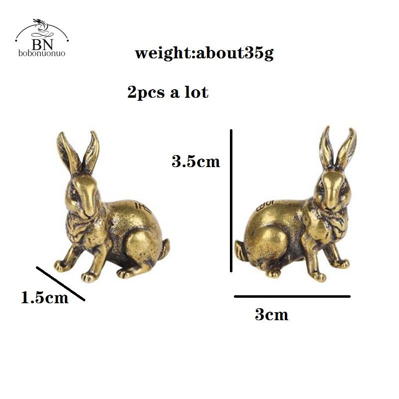 

Античная медь Зодиак Милая статуэтка кролика Орнаменты 1 пара Винтажная твердая латунь Животное Миниатюрная фигурка Чайный питомец Украшение для стола