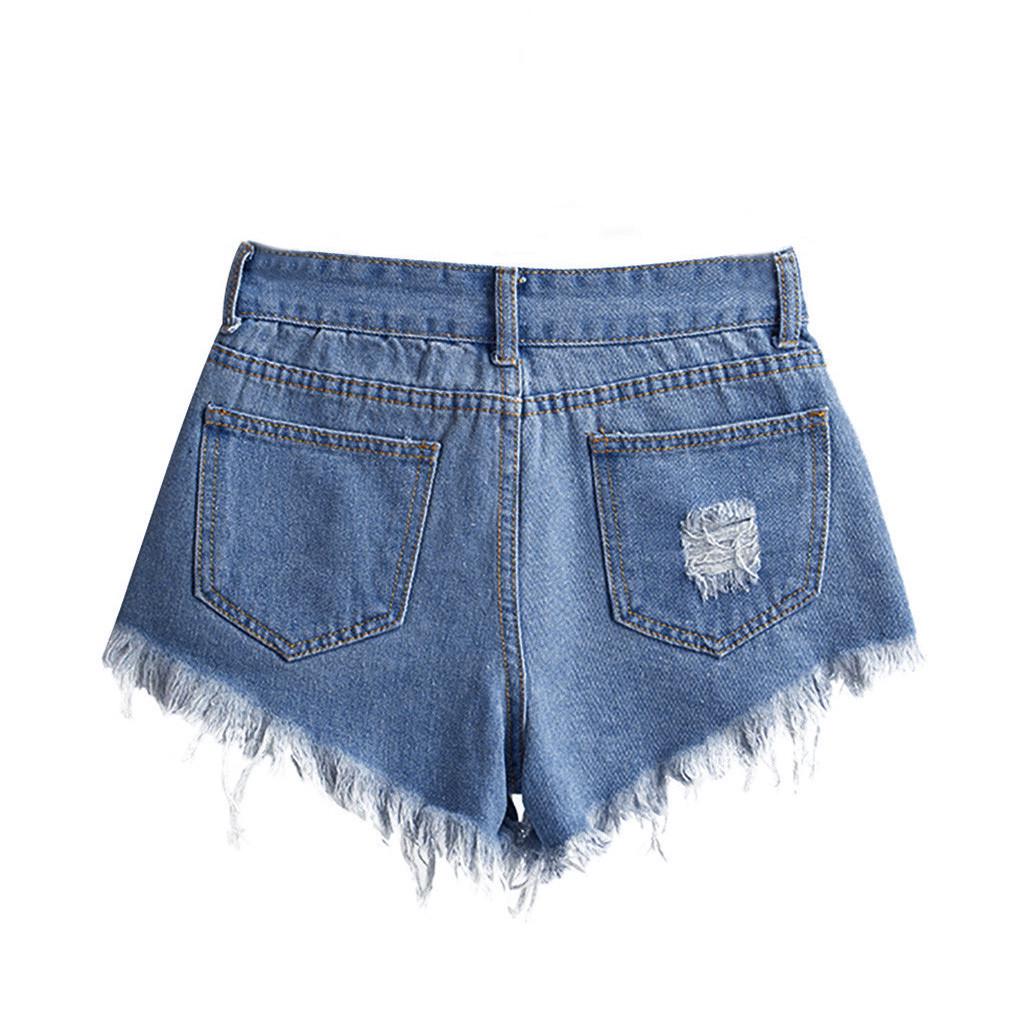 Модные женские джинсы с карманами и дырками — фото 3