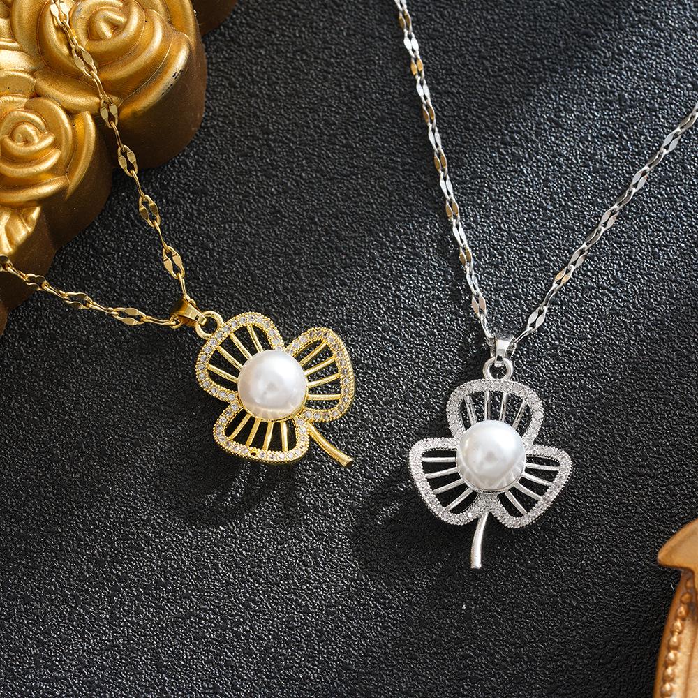 Japanese-Korean Style Four-Leaf Clover Pearl Necklace, Titanium Steel, Women's Luxury Design, High-End Clavicle Chain.