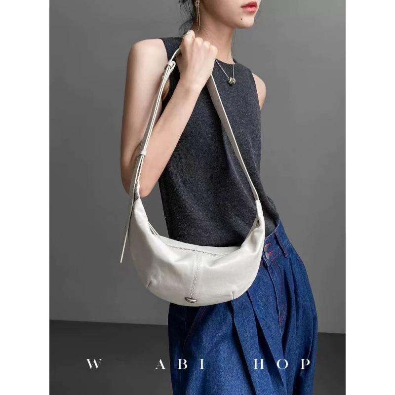 

Нишевый дизайн минималистичная мягкая кожа сумка-пельмень ленивый стиль сумка-круассан для通勤 сумка через плечо сумка-мессенджер тренд универсальный белый