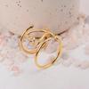 Abstract Wavy Gold Cuff Ring: Bold, multi-layered open design with organic lines, perfect as a modern adjustable statement ring.