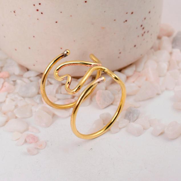Abstract Wavy Gold Cuff Ring: Bold, multi-layered open design with organic lines, perfect as a modern adjustable statement ring.