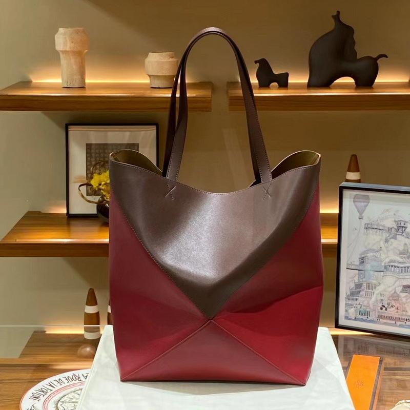 2026 New Genuine Leather Women's Bag Deformation Geometric Splicing Folding Tote Single Shoulder Diagonal Cross Trendy Manufacturer
