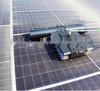 Remote-Controlled Solar Panel Dry Cleaning Robot for Power Stations