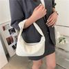 Internet celebrity retro simple bag women 2025 new fashion casual oblique span woven bag shoulder armpit small square bag