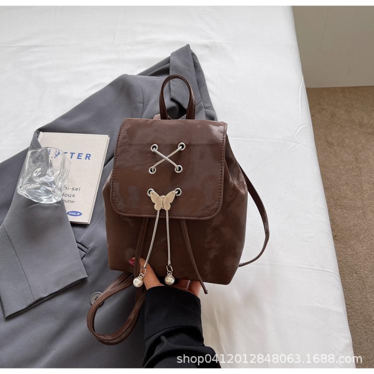 

Женский рюкзак высокого класса, новая корейская версия, простой модный рюкзак в стиле колледжа, нишевый дизайн, портативный дорожный рюкзак темно-коричневого