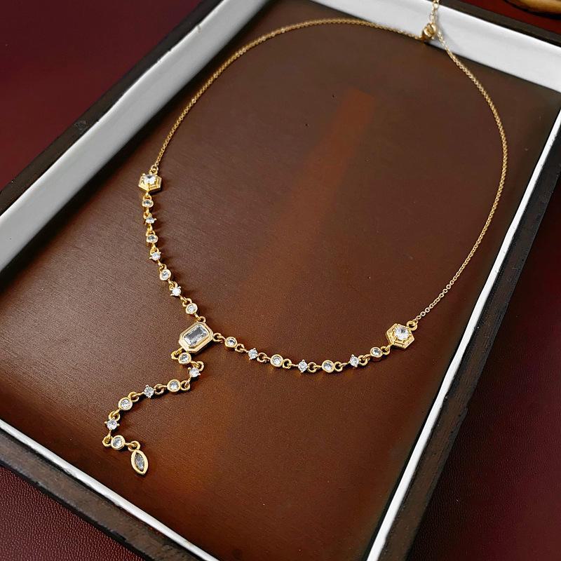 Gold Electroplated Oval Zircon Tassel Necklace - Korean Light Luxury, High-End Sweater Chain, European & American Style for Women