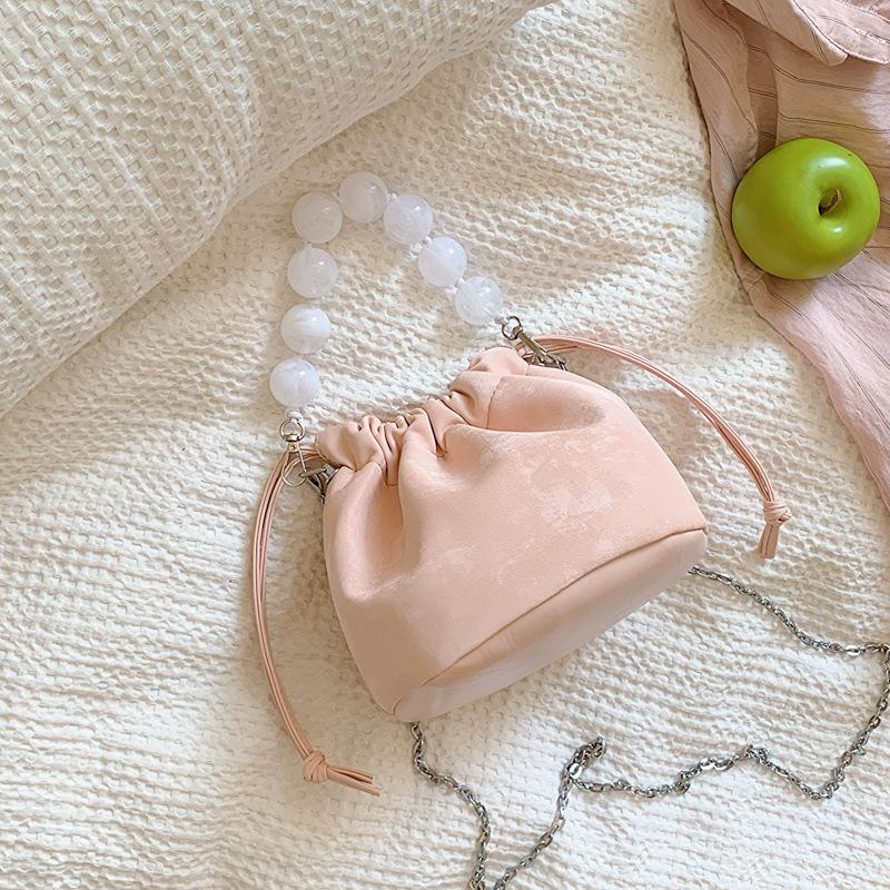 

Hand carry casual bucket bag women s 2024 summer new fashion simple shoulder bag trendy women s bag personalized messenger bag рожевий