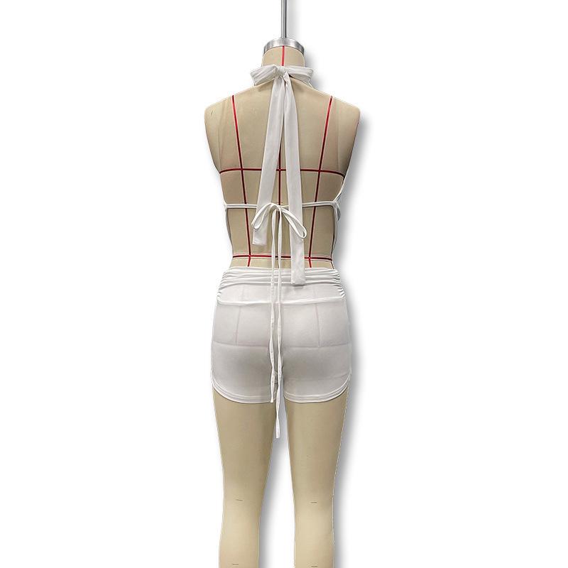 European & American Sexy Low-Cut Halter Backless Top with High-Waisted Ultra-Short Pants Two-Piece Set for Women.
