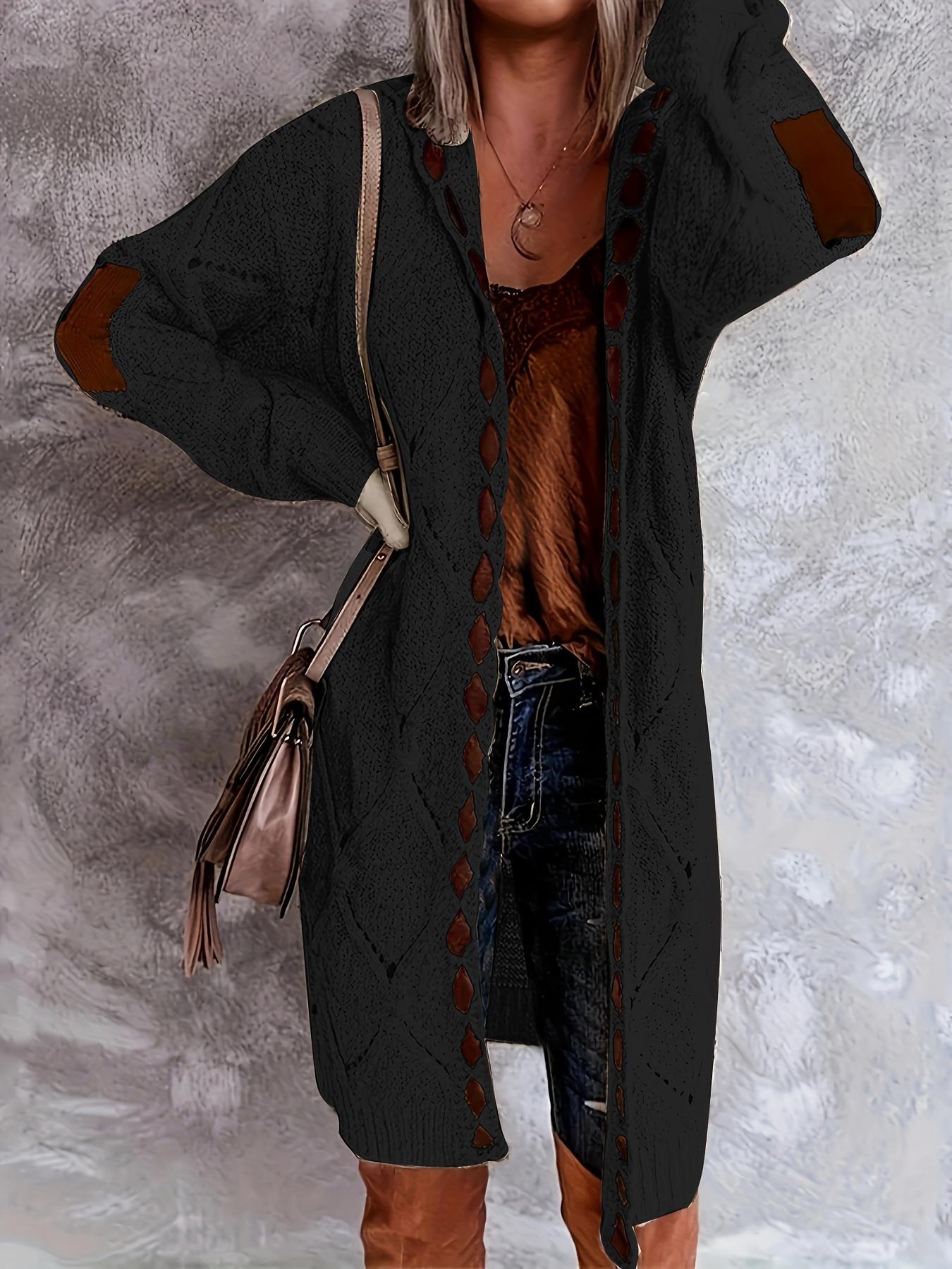 

Вязаный кардиган в стиле колор-блок с длинными рукавами и модным вырезом. Привлекательный дизайн с открытой передней частью. Идеальный базовый предмет женской моды. 5XL чёрный