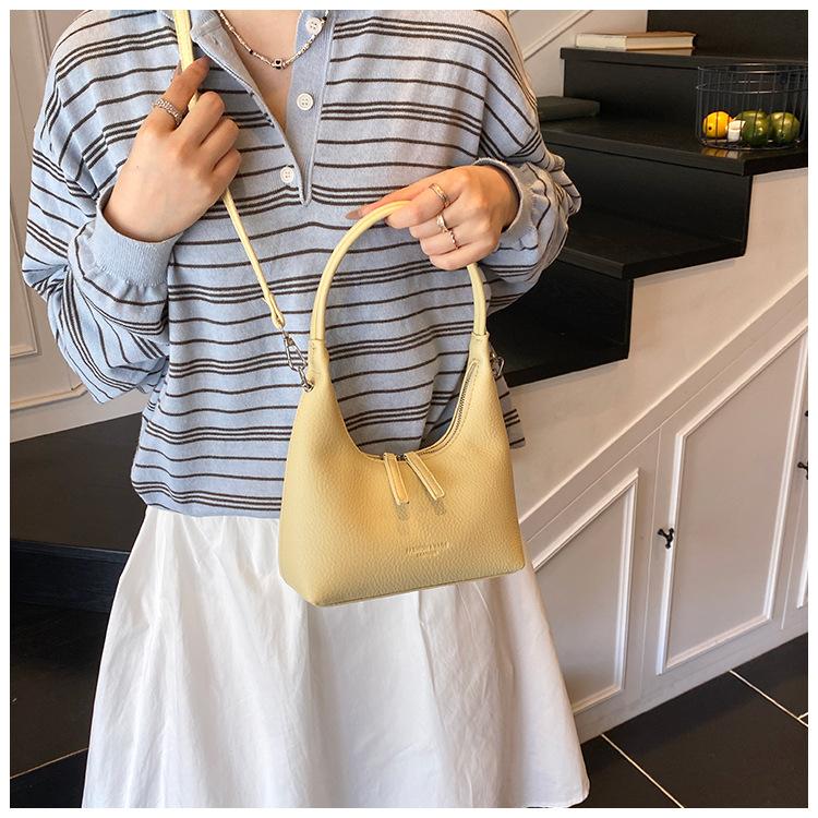 High-end niche bag women's new fashion simple messenger bag versatile shoulder armpit bag