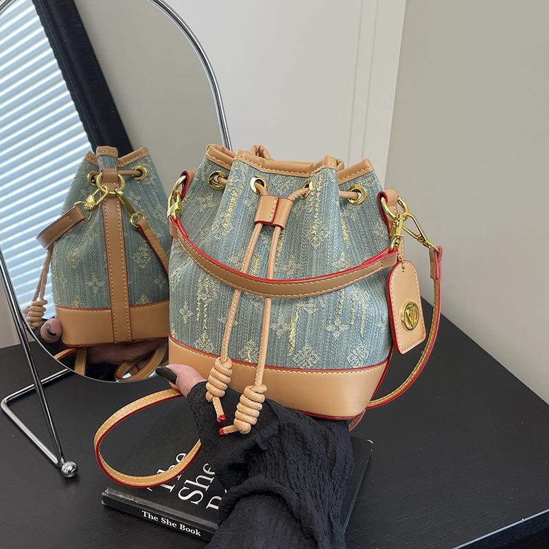New versatile retro bucket bag New women's bag Fashion and high-end portable shoulder bag Crossbody bag