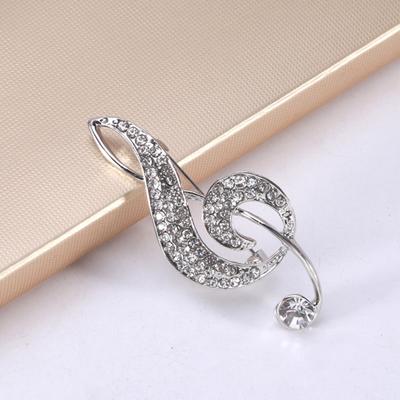 Broche créative en forme de Note musicale pour femmes, strass brillants incrustés, épingle de costume, châle à revers, Badge, accessoires de manteau