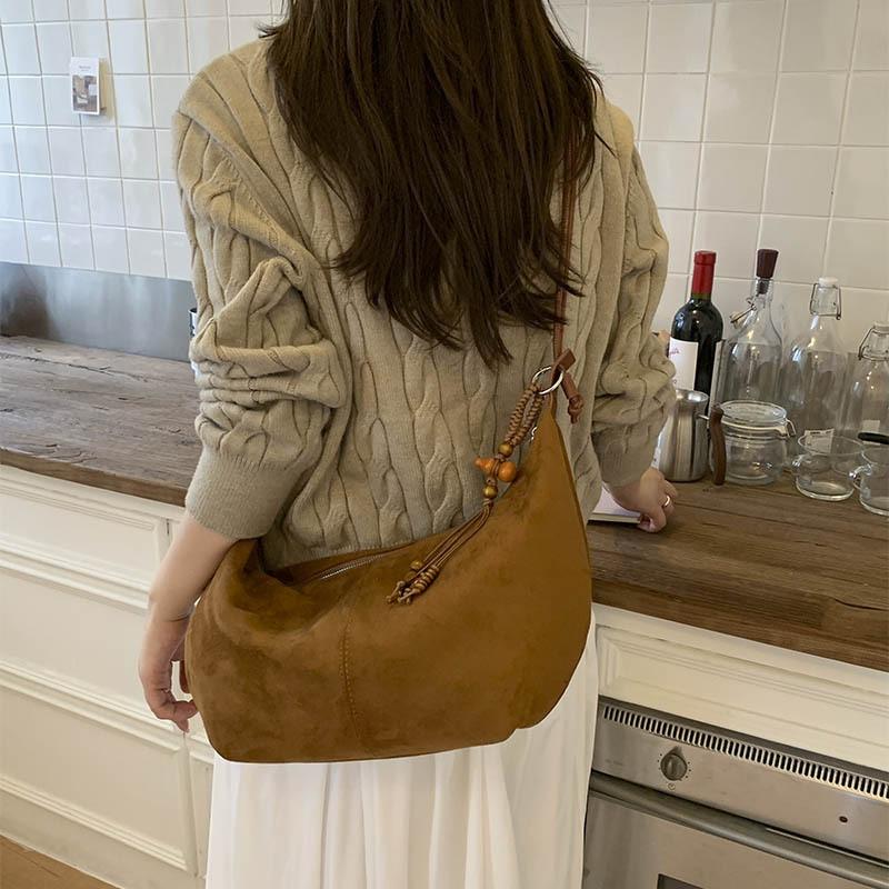 Fashion commuter high-end women's shoulder oblique straddle bag autumn retro versatile portable underarm bag