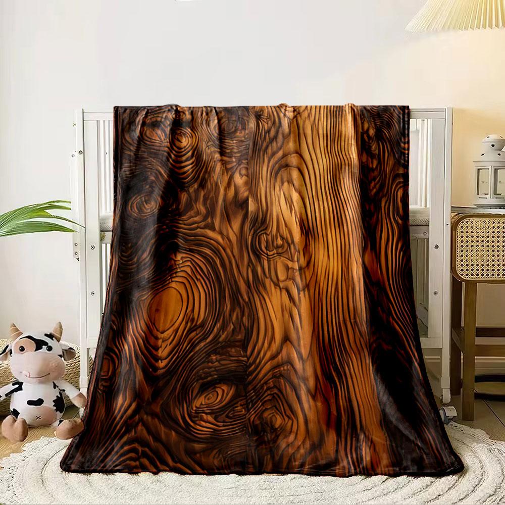 Swirling and wavy wood grain pattern with rich brown and amber tones. for all seasons blanket lunch break throw gift