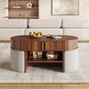 Oval storage coffee table with vertical fluted panelling, set with fabric stools, body made of particleboard+MDF, metal handles, with sliding doors