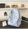 Schoolbag schoolbag college student simple Korean version tie-dye high school backpack large capacity junior high school Japanese ins versatile