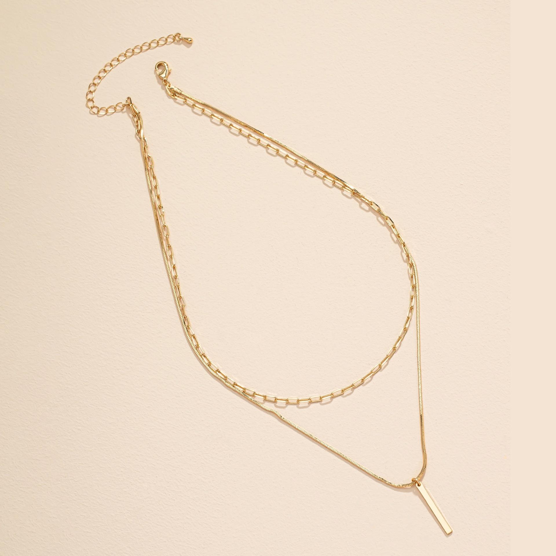 

A golden yellow multi-layer metal square strip pendant necklace is suitable for ladies and girls to party and vacation