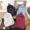 New backpack, college student, junior high school student schoolbag, large capacity, simple and lightweight travel backpack