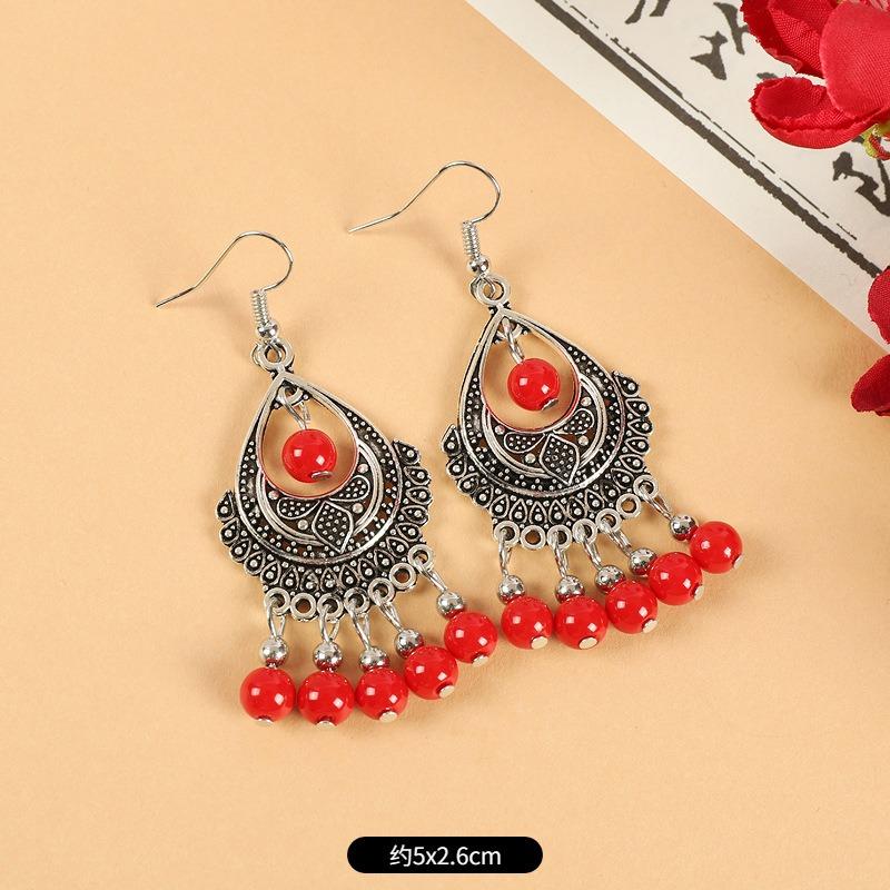 

Retro earrings women s long red fringed bohemian earrings Yunnan vacation exotic wind ear jewelry