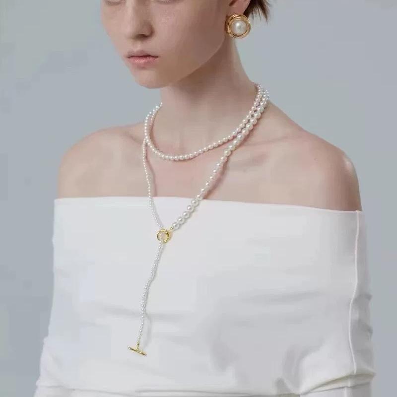 Gradient Pearl Necklace for Women - French Luxury Niche Design, Versatile Long OT Buckle Sweater Chain.