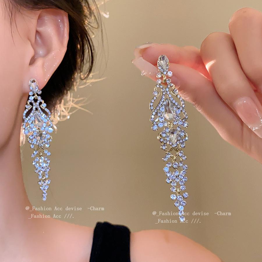 Silver needle with diamonds hollow water drop fringed earrings retro court style elegant earrings light luxury high-end earrings