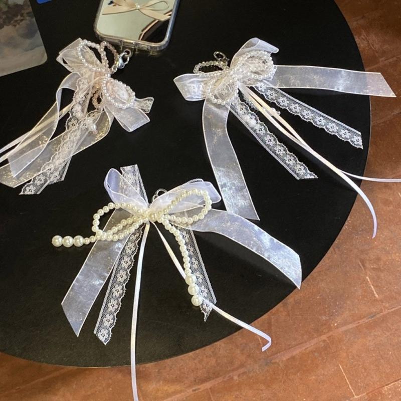 Eleganter Schlüsselanhänger mit Perlen, Handyanhänger, einzigartiger Schlüsselanhänger, Schleife, Taschenanhänger, Accessoire für Geldbörse und Rucksack