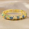 Stylish Four Leaf Clovers Enamel Alloy Bracelet Featuring Smooth Drip Oil Craft and Ethnic Flair Versatile Use