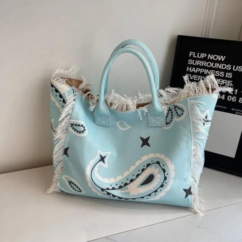 2026 Damen-Tragetasche für Reisen Strandtasche Große Kapazität Schulter-Pendlertaschen Hand-Quaste Jeans-Print Quaste Gespleißte Handtaschen