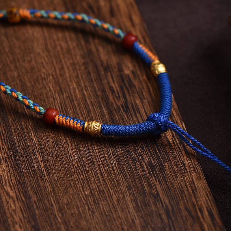 Tibetische Dzi-Perlenanhänger-Halskette mit handgewebter Baumwollfadenkordel