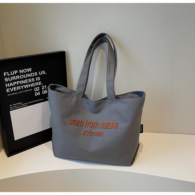 

2025 large-capacity cloth bag, casual shoulder underarm bag, simple and versatile, casual commuting, practical, portable handbag. серый