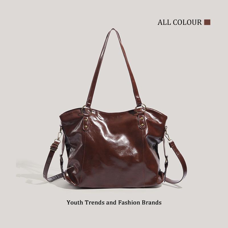

Autumn and winter large-capacity bags, new bags, women s versatile oblique span bags, casual shoulder tote bucket bags, tide коричневый