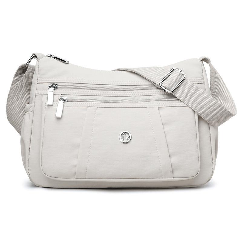 Single-shoulder Bag - Stylish and Simple Backpack with Multiple Functions for Travel, Featuring Multiple Compartments and A Small Square Shape.