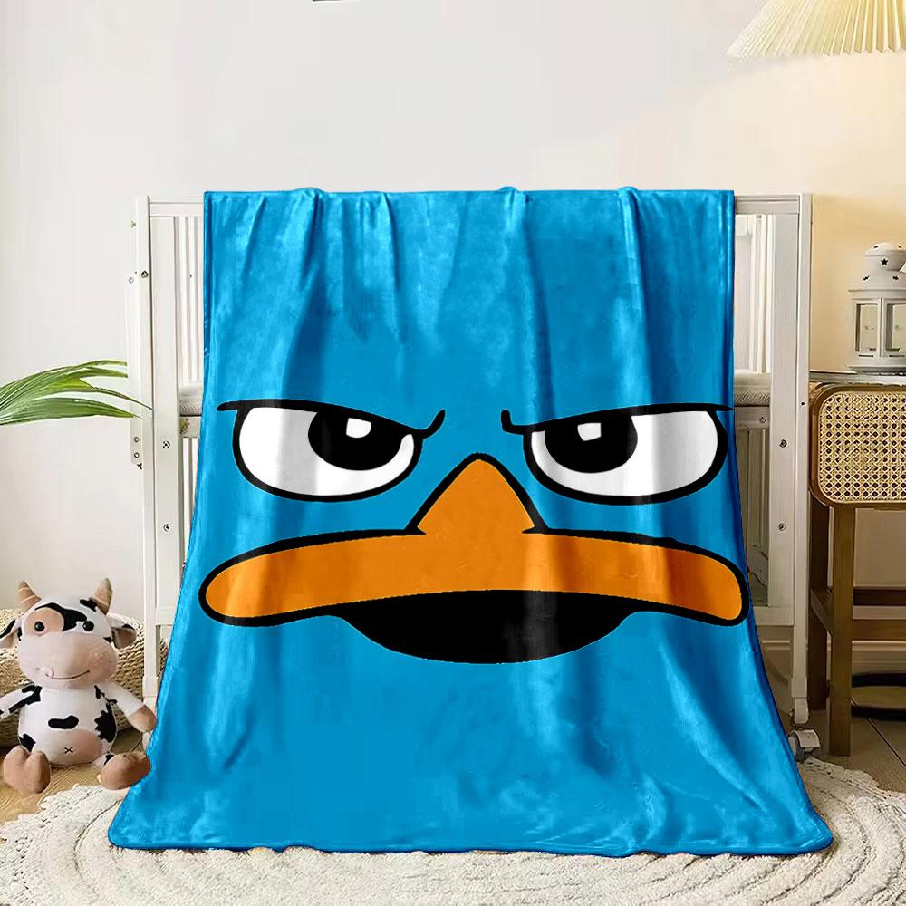 Stylized blue cartoon face with sharp eyes and an orange beak. for all seasons blanket lunch break throw gift