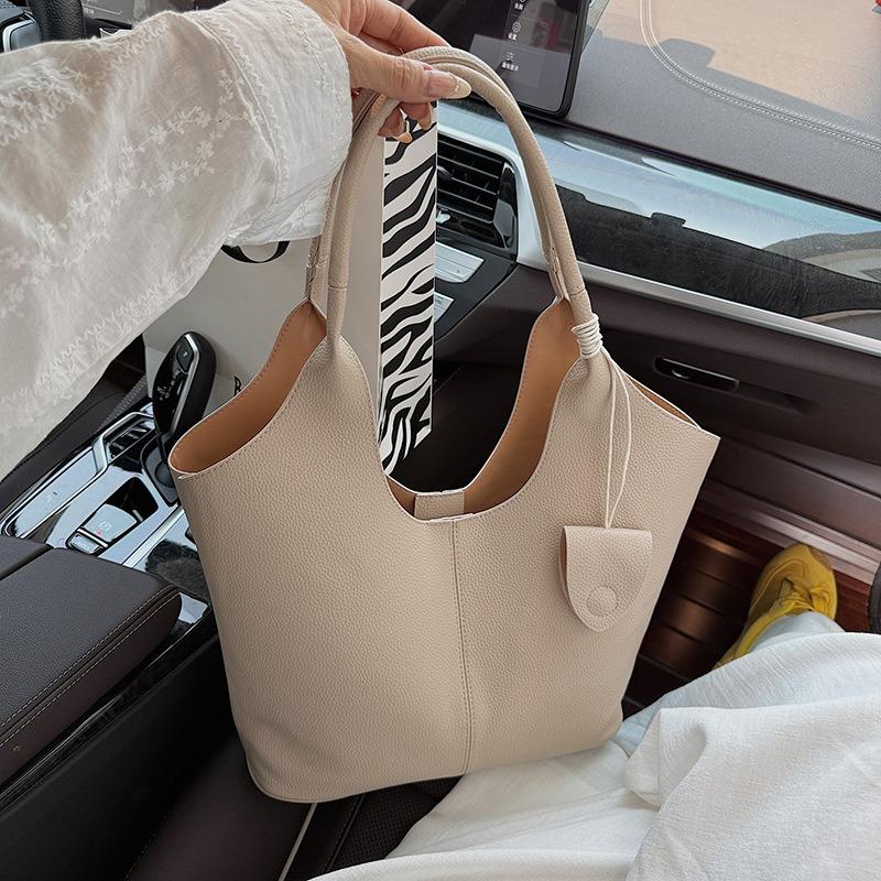 Simple niche bucket bag women's summer new large-capacity versatile casual shoulder tote armpit bag