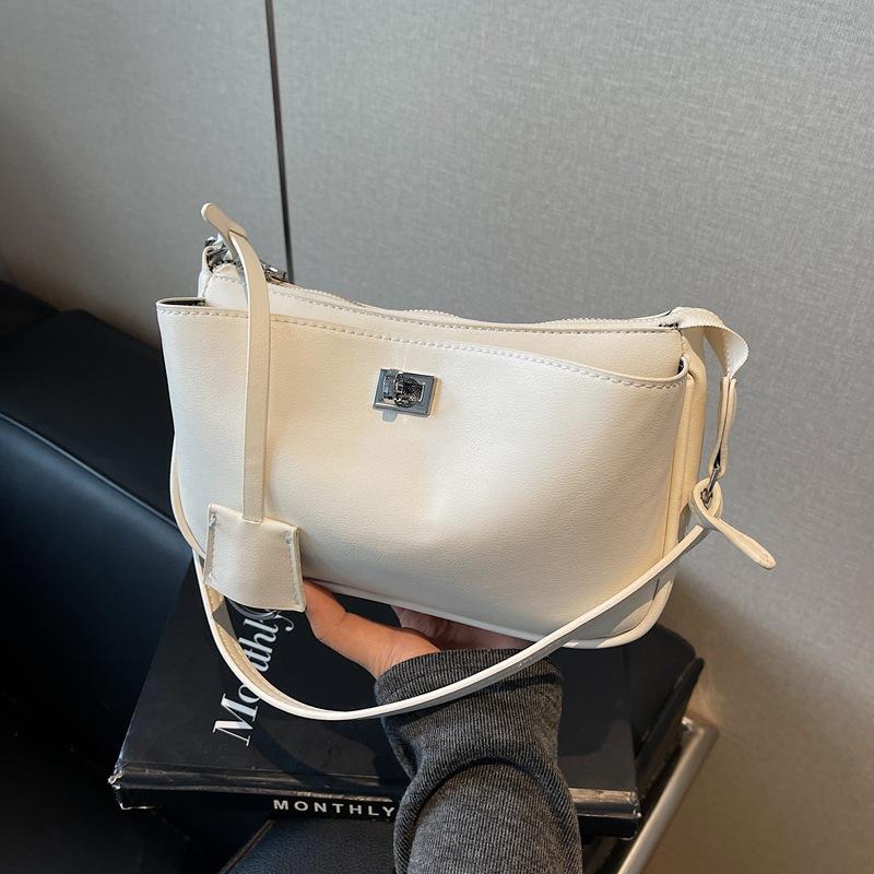 

Small bag women s versatile new retro messenger bag women s simple shoulder armpit bag