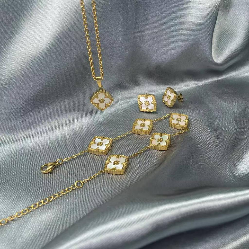 Neues europäisches und amerikanisches Diamantblattgras-Armband-Halsketten-Ohrring-Set, plattiert mit Retro-Diamant-Palast-Halskette