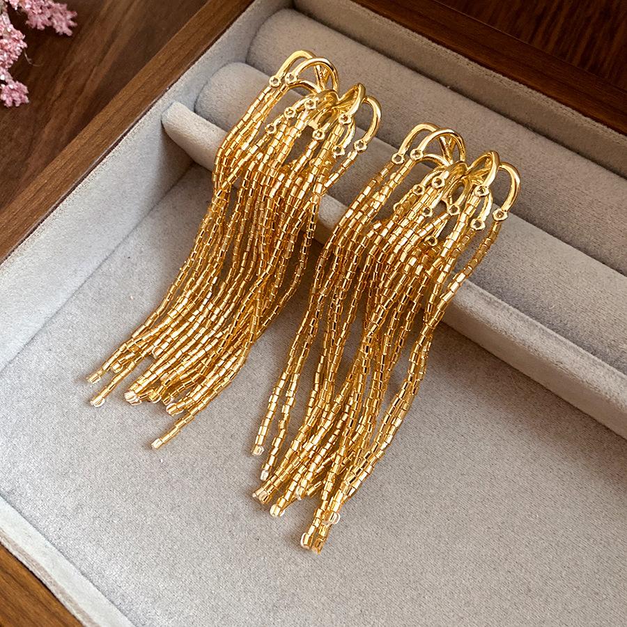 

European and American silver needle fireworks glass fringed earrings simple fashion temperament earrings light luxury high-end earrings women