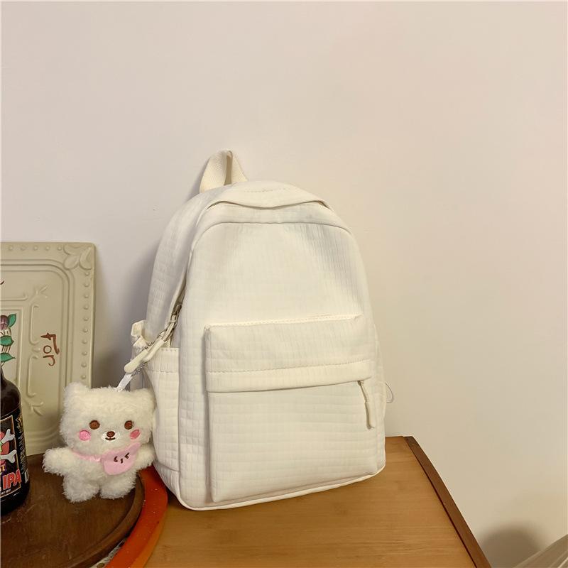 Schoolbag high-value backpack women's 1011 new casual simple large-capacity junior high school backpack commuting class schoolbag