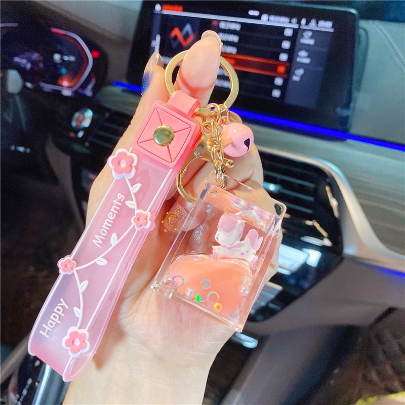 Lila Stern Flüssiger Treibsand Schlüsselanhänger mit Kirschblüten Öl-gefülltem Anhänger - Niedlicher 3D Rucksackanhänger für Frauen