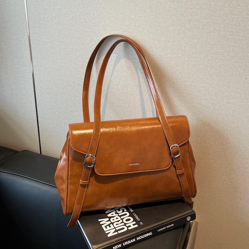 

2025 new commuter personalized large-capacity tote bag femininity niche trend shoulder bag premium texture women s bag коричневый