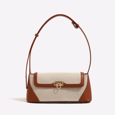 Sac d'été polyvalent rétro français à bandoulière unique sous l'aisselle, sac baguette de luxe léger et de niche, sac à main tendance pour femmes