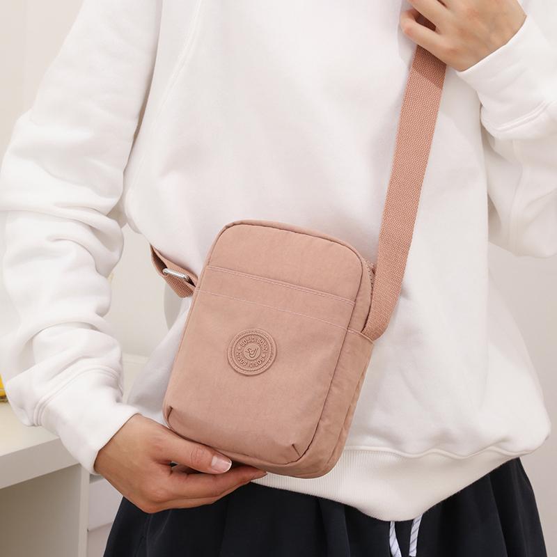 Compact Nylon Crossbody Bag with Double Zipper Closure Adjustable Strap Small Casual Purse for Daily Travel