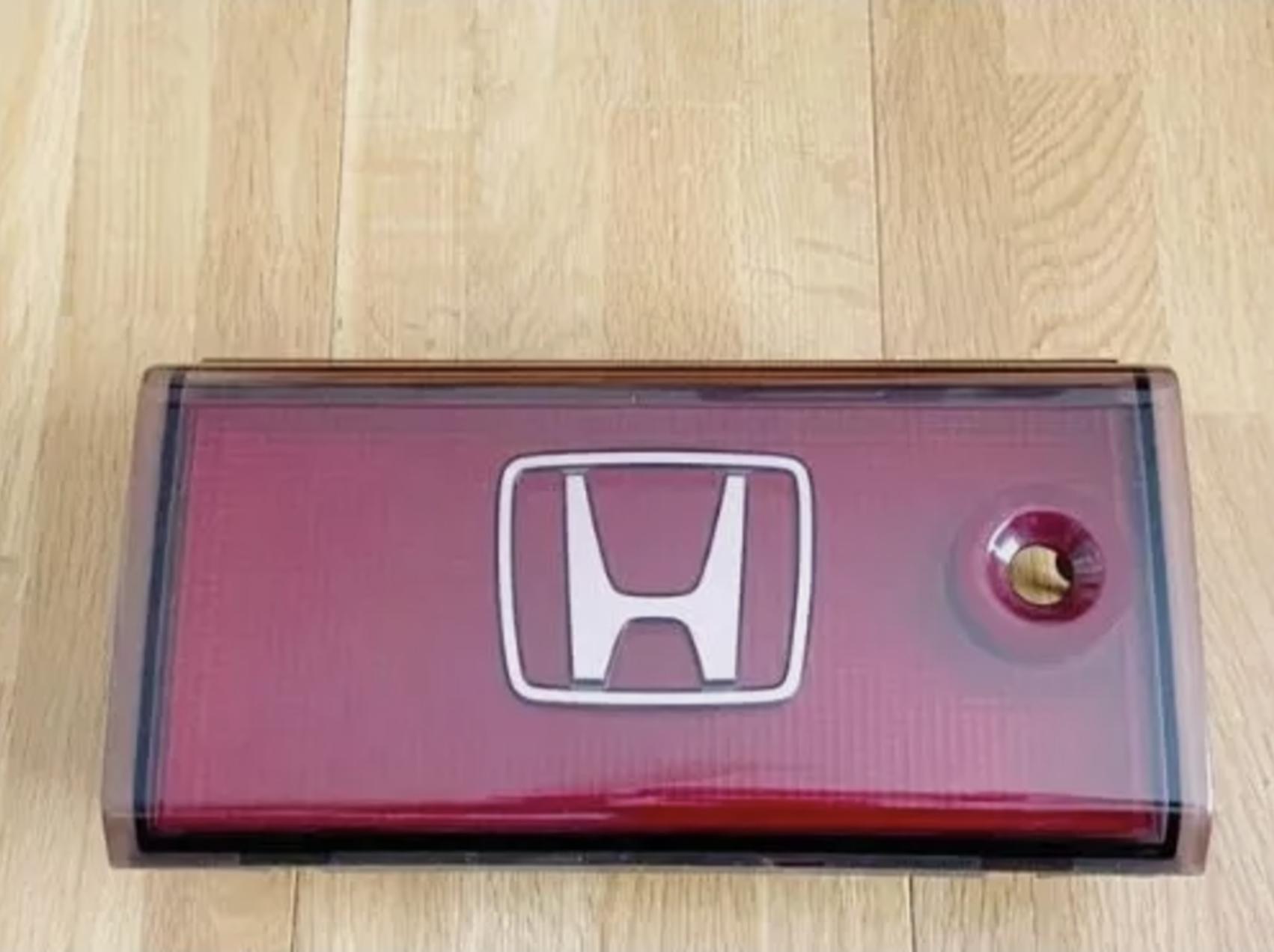 

HONDA OEM NSX Titanium Color H-logo Rear Back Panel Garnish 75570-SL0-N21