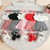 2026 Grenzüberschreitendes Niedliches Sommer-Kleinkindkleid-Set: Kleid mit Puffärmeln im Hahnentrittmuster, Socken und Kopfbedeckung